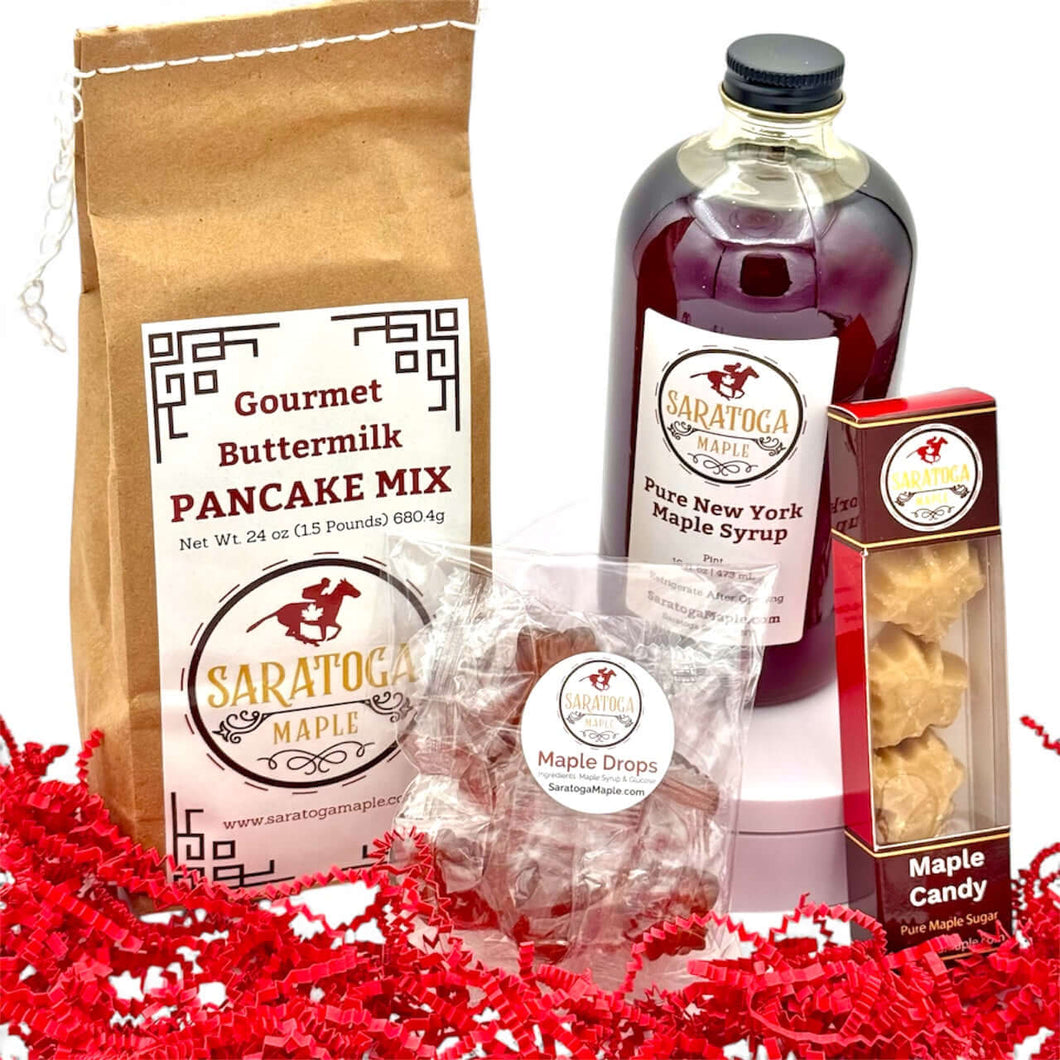 A Maple Gift Basket to Send to loved ones that includes NY Maple Syrup, Gourmet Pancake Mix, Maple Sugar Candies, and maple hard candies.