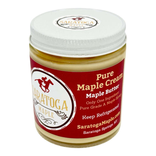 Glass Jar of Saratoga Maple Pure Maple Cream Spread on a white background.